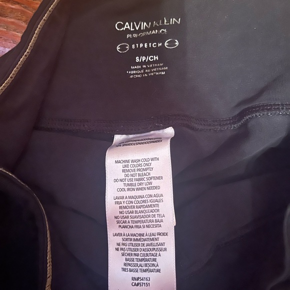 Calvin Klein Black Form-Fitting Pants with Full Length and Side Graphic - Picture 2 of 3